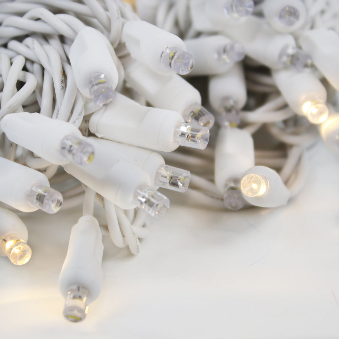 50-light 5mm Warm White LED Strobe Lights, 4" Spacing White Wire