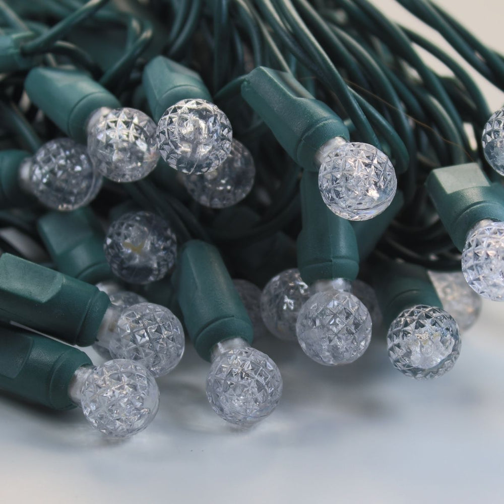 50-light G12 Warm White LED Christmas Lights, 4" Spacing Green Wire