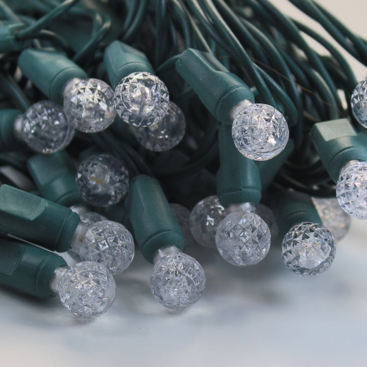 50-light G12 Warm White LED Christmas Lights, 4" Spacing Green Wire