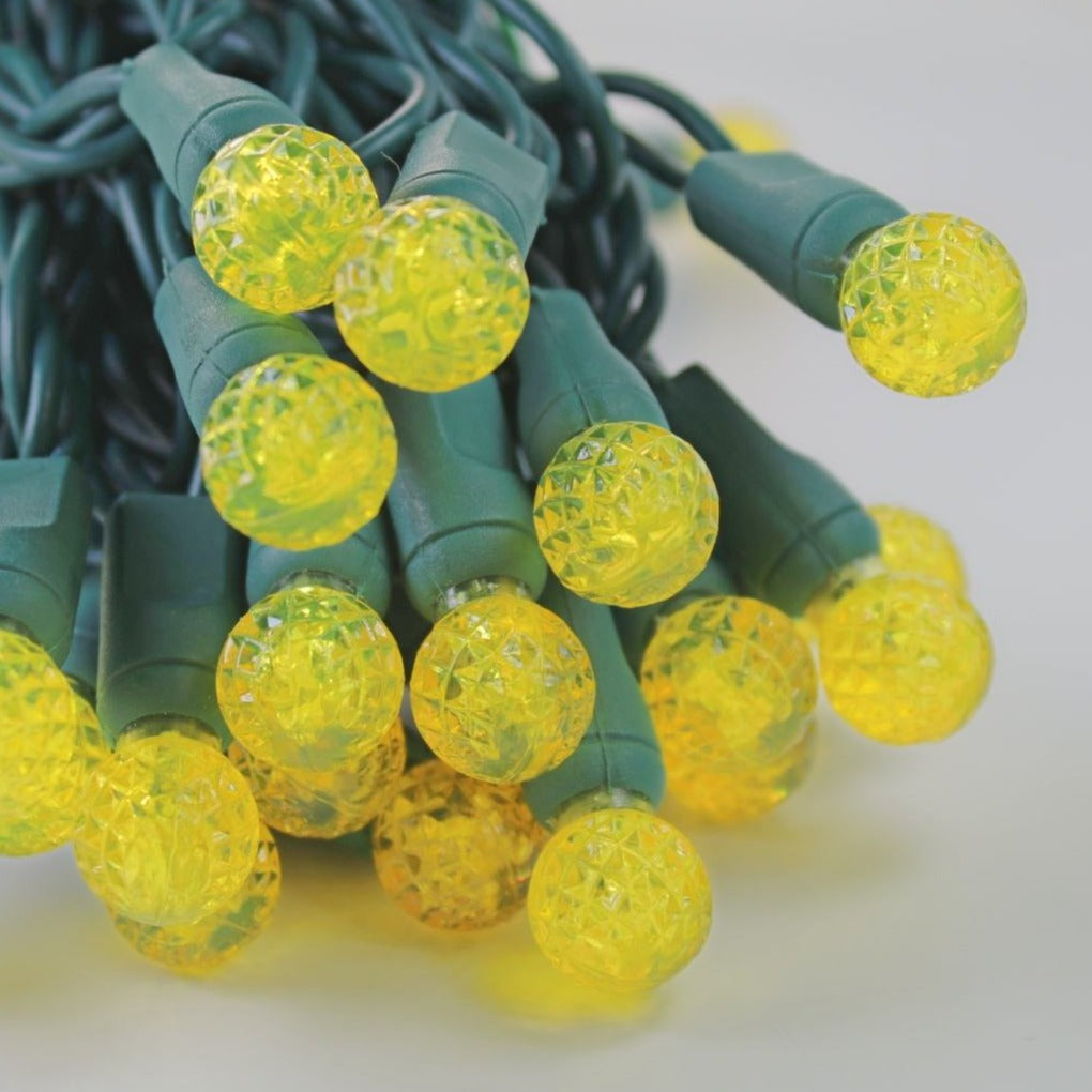 50-light G12 Yellow LED Christmas Lights, 4" Spacing Green Wire