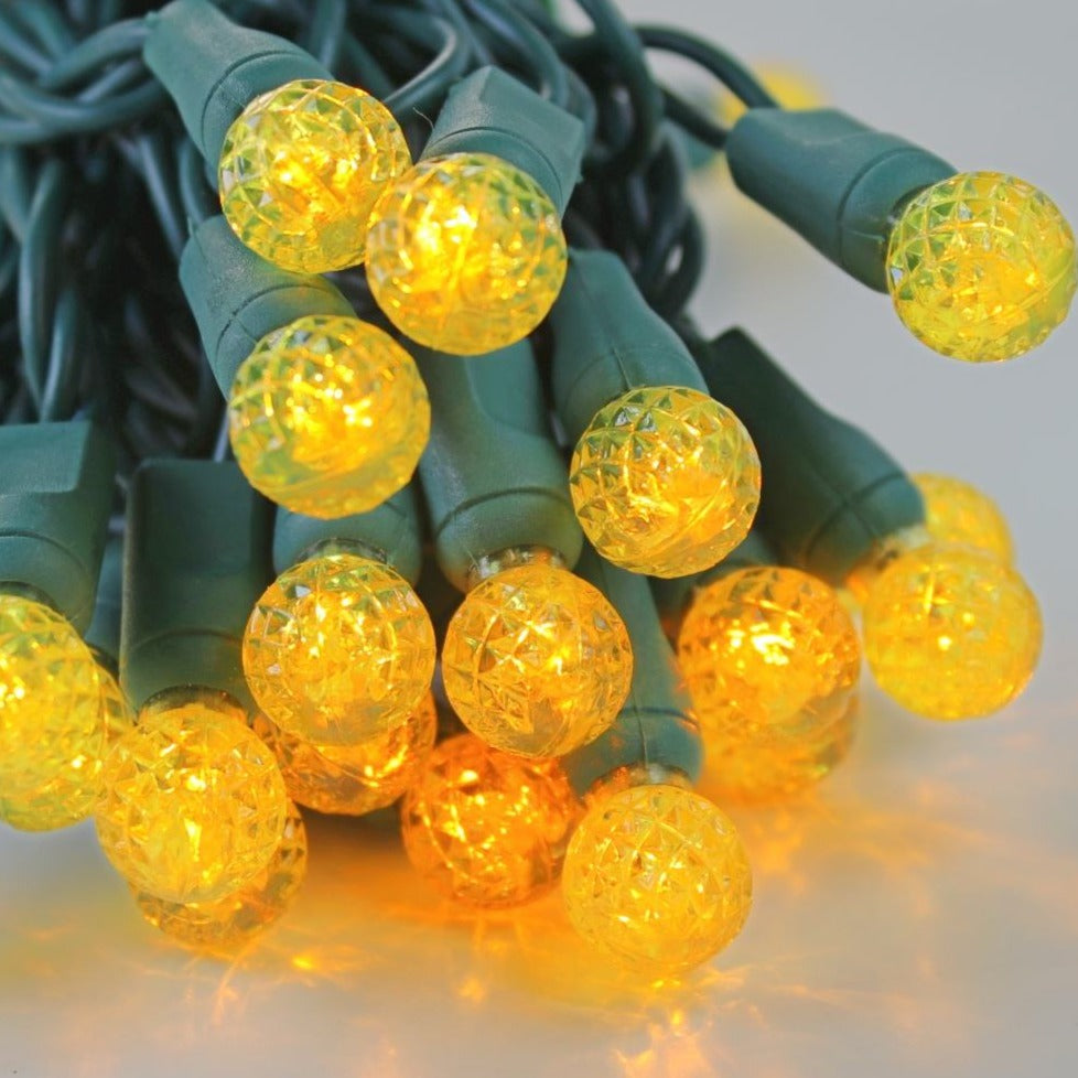 50-light G12 Yellow LED Christmas Lights, 4 Spacing Green Wire