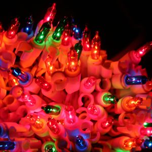 group of multi mini lights on white wire with clips
