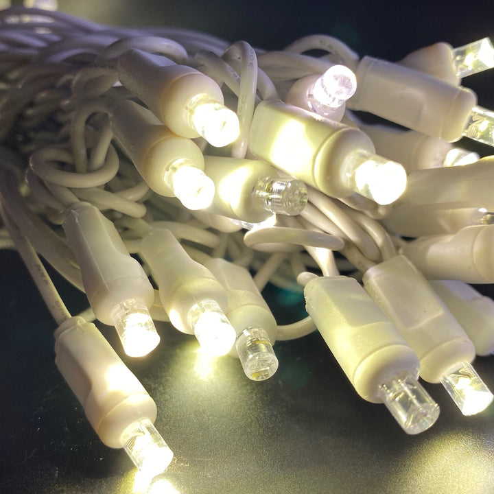 50-light 5mm Warm White Twinkle LED Christmas Lights, 4" Spacing White Wire