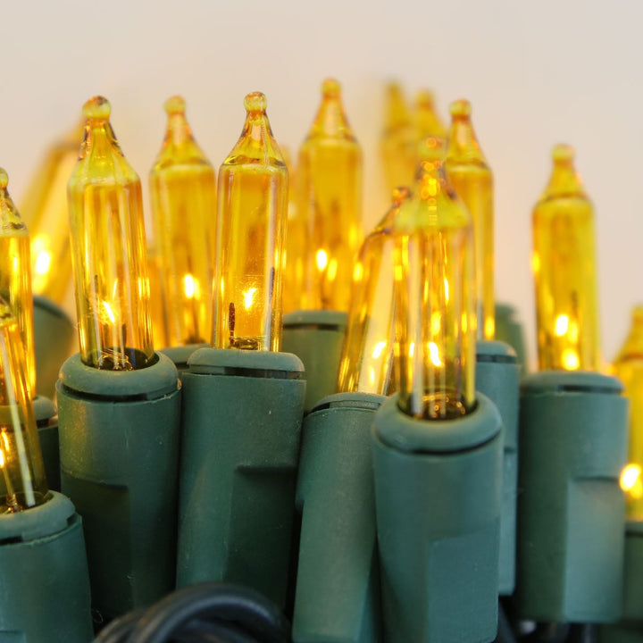 50-bulb Yellow Mini Lights, 6" Spacing, Green Wire