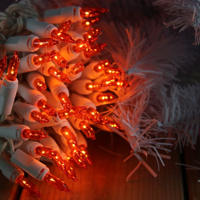 Orange Christmas lights 100 bulbs 6 inch spacing White Wire