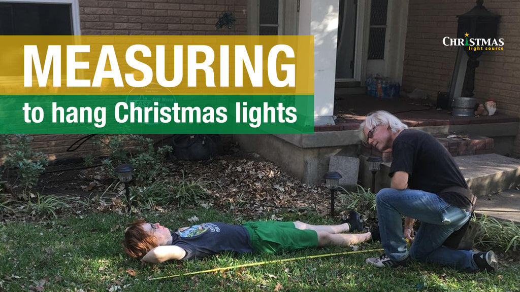 Measuring to hang Christmas lights – use your family!