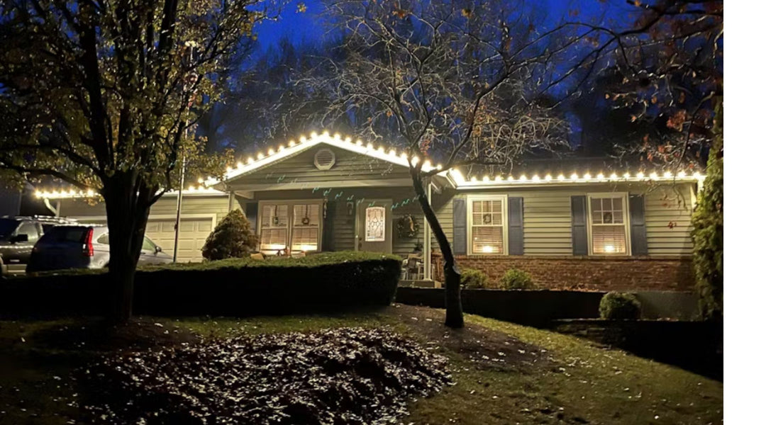 House outlined with warm white led bulbs