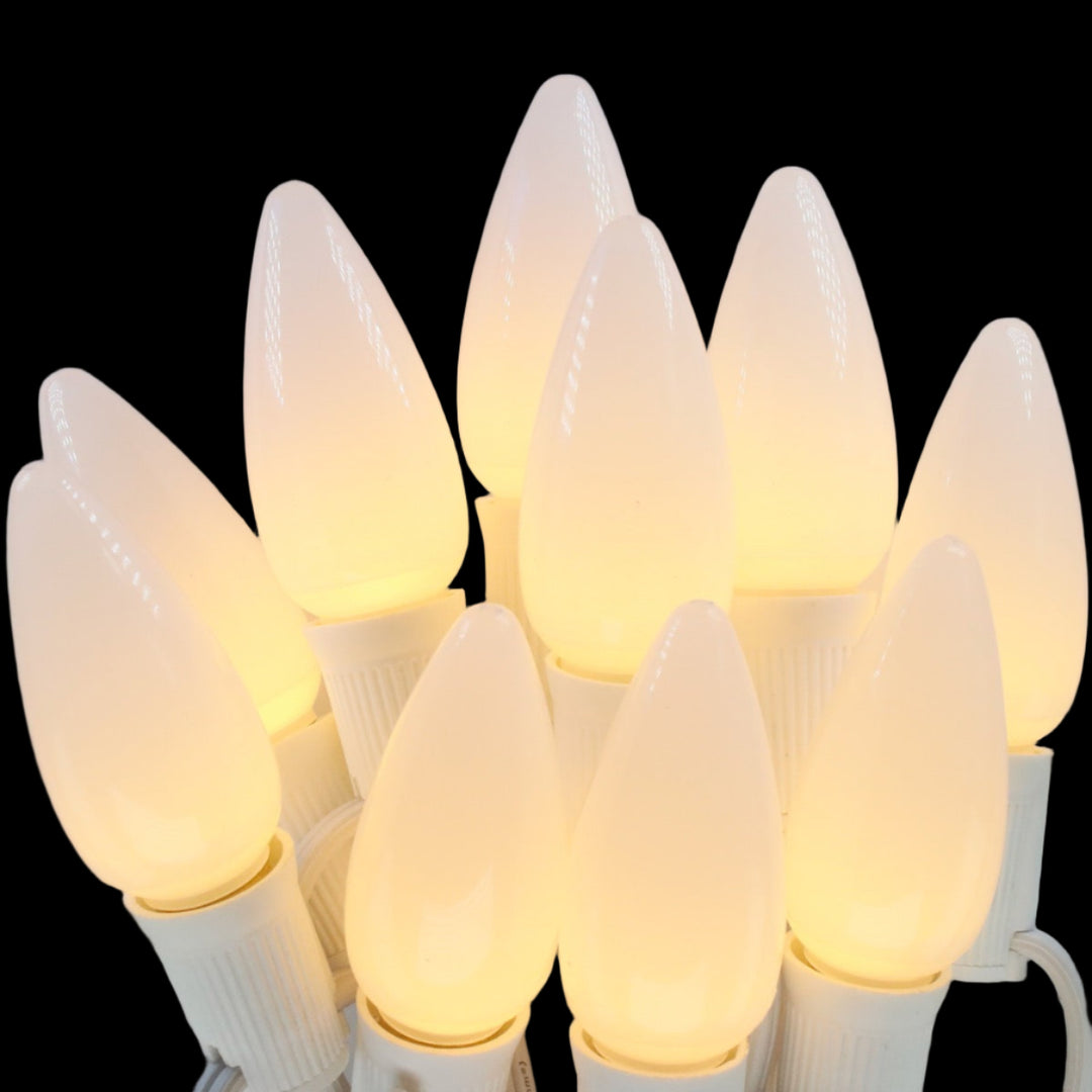 Close-up of multiple light bulbs on a white background