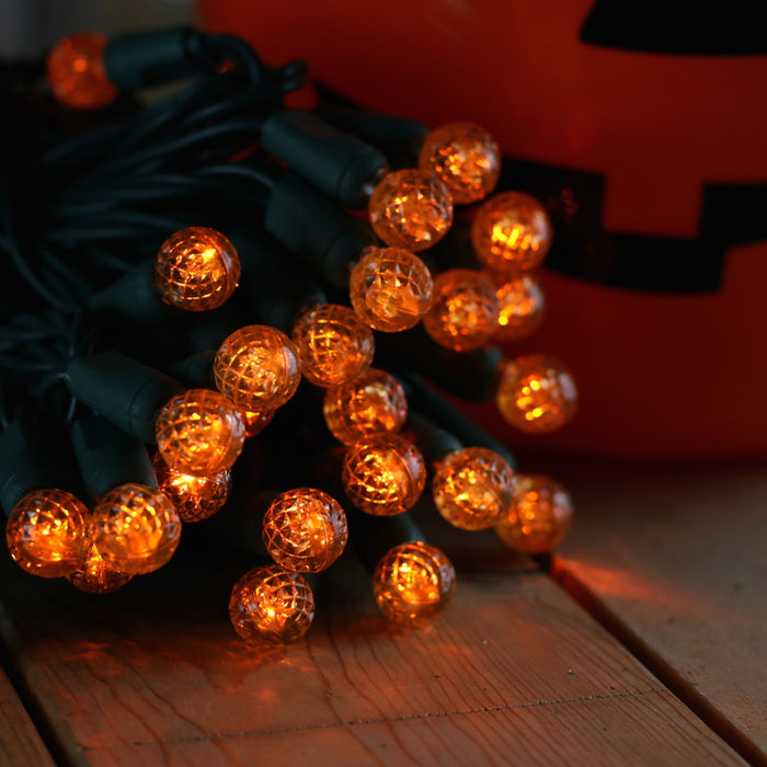 50-light G12 Orange LED Christmas Lights, 4" Spacing Green Wire