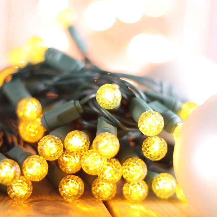 50-light G12 Yellow LED Christmas Lights, 4" Spacing Green Wire