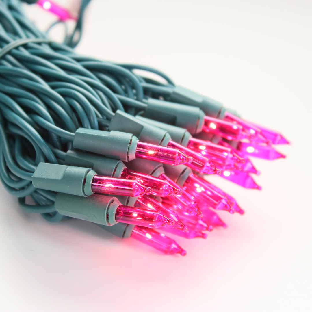 side view of Pink mini lights on green wire