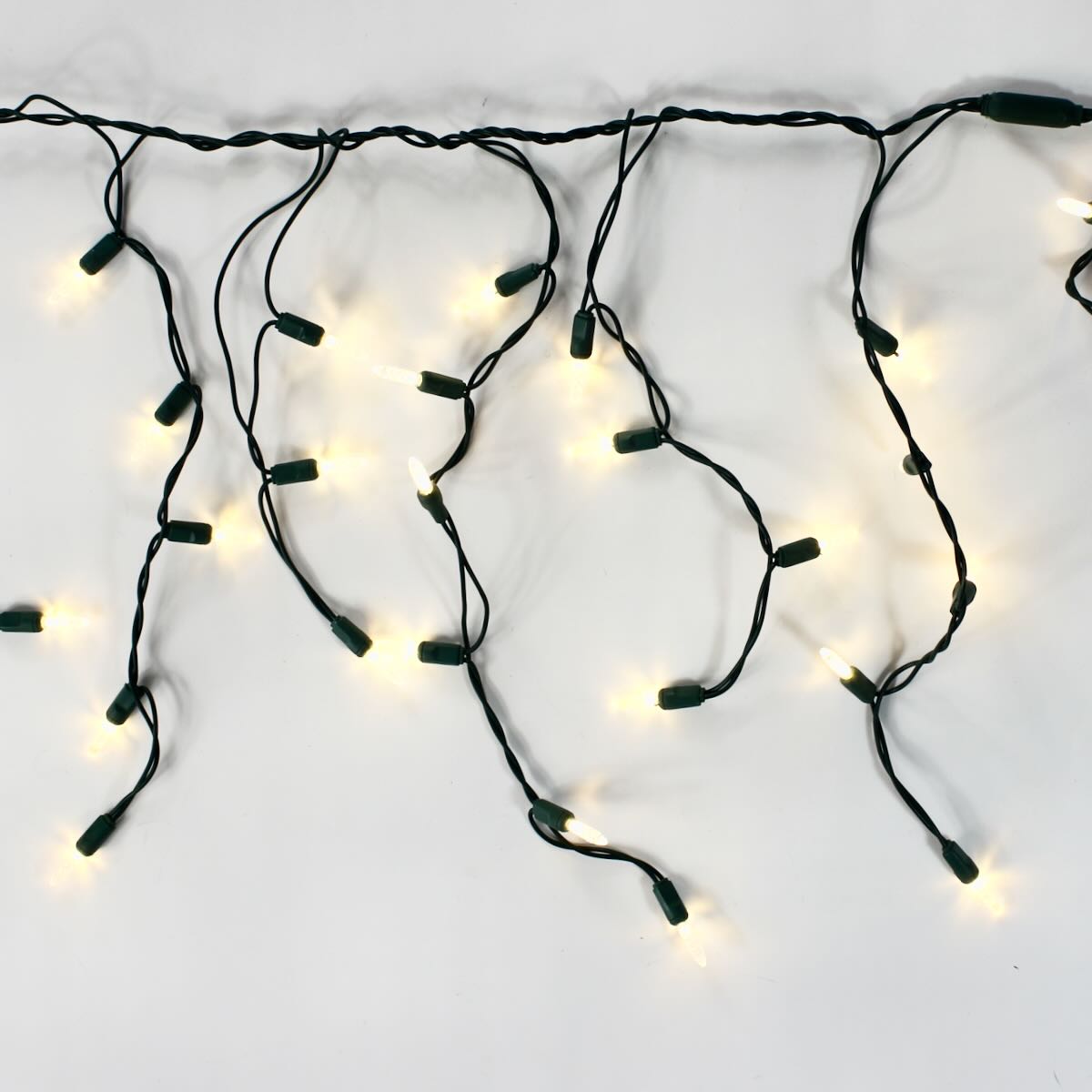100-light M5 Warm White LED Icicle Lights, Green Wire – Christmas Light ...